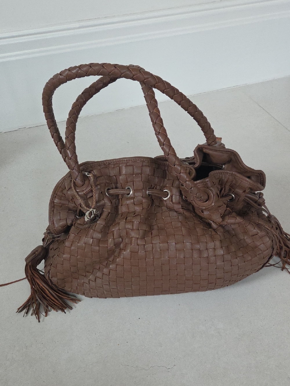 Woven Drawstring Shoulder Bag in Brown